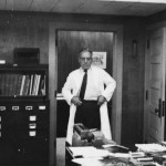 1950s in the door of his office in the Stadium in a white coat.